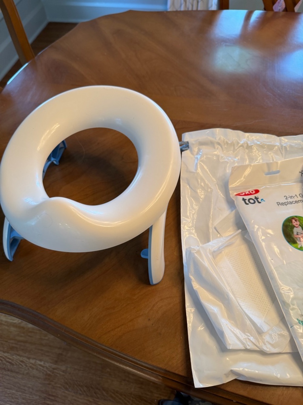 Oxo Tot White and Light Blue 2-in-1 Travel Potty Seat